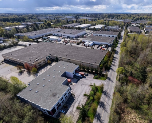 Aerial View Of Industrial Park Warehouses And Logistics Facilities