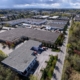 Aerial View Of Industrial Park Warehouses And Logistics Facilities